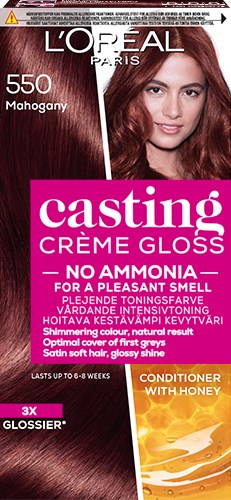 L'Oreal Paris hårfärg i Mahognyfärg, visar en kvinna med långt, glänsande, rödbrunt hår.