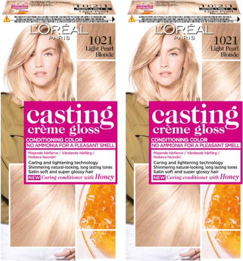 Förpackning av hårfärg märkt 'L'Oréal Paris Casting Créme Gloss' i Light Pearl Blonde färg med honungsdoft.