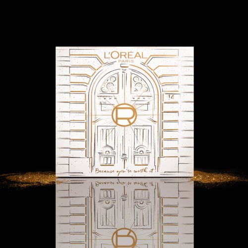 En hvit dør med L'Oréal-logo, et oransje 'R' symbol, og fransk tekst, satt mot en svart bakgrunn med gulldetaljer.