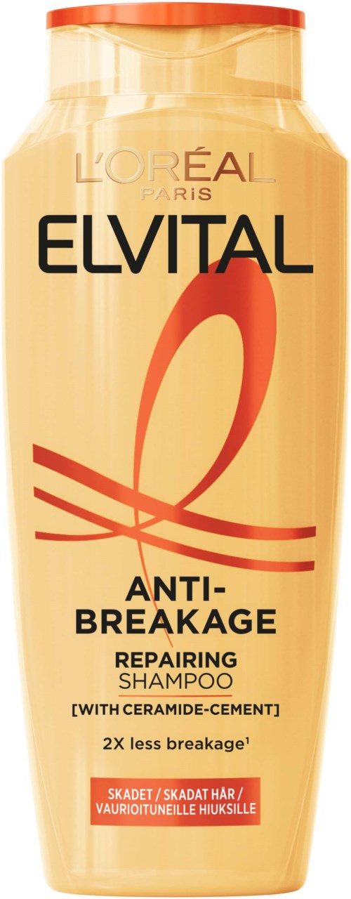Beige Shampoo-Flasche mit schwarzen und roten Text, verspricht Haarbruch zu reparieren und zu verringern. Marke ist Elvital.