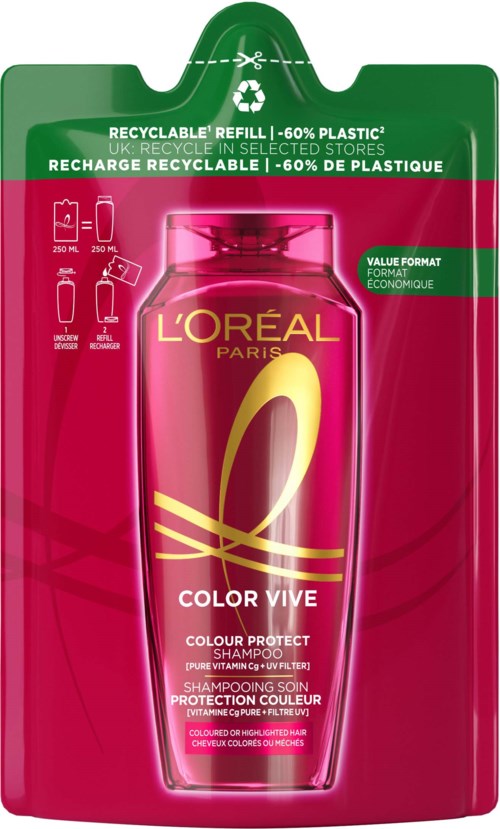 Shampoopullo, jonka merkki on L'Oréal Paris, etiketti 'Color Vibe' ja pinkki-keltainen muotoilu, vihreässä pakkauksessa.