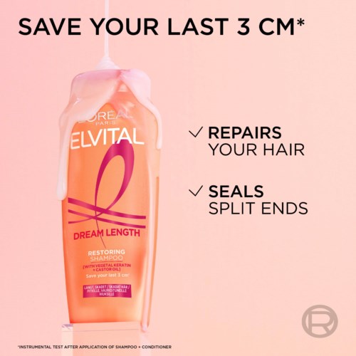 A pink shampoo bottle labeled Elvital Dream Length Restoring Shampoo, with text about repairing hair and sealing split ends.