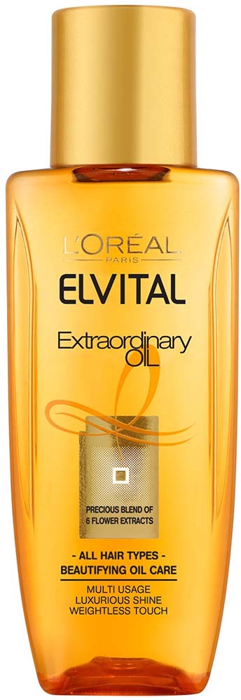 A golden bottle of L'Oreal Elvital Extraordinary Oil hair product, designed for all hair types and includes flower extracts.