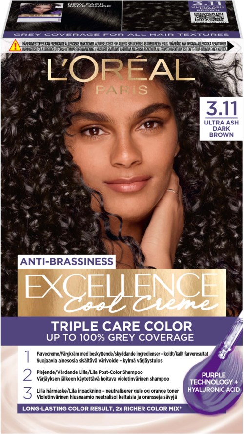 A hair dye box with a woman with curly dark hair, L'Oréal logo, and purple, brown, and gold text.