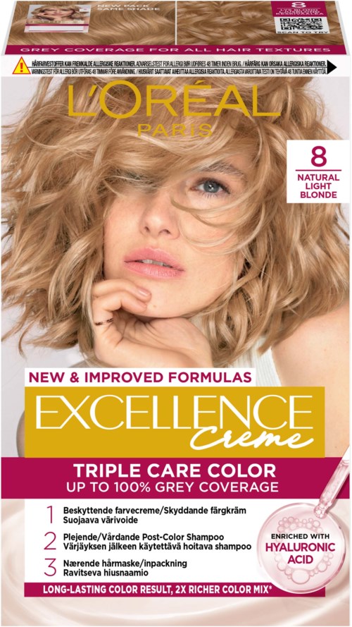 Blonde vrouw met krullend haar raakt haar gezicht aan, promoot L'Oreal Excellence Creme haarkleuring voor grijsdekking.