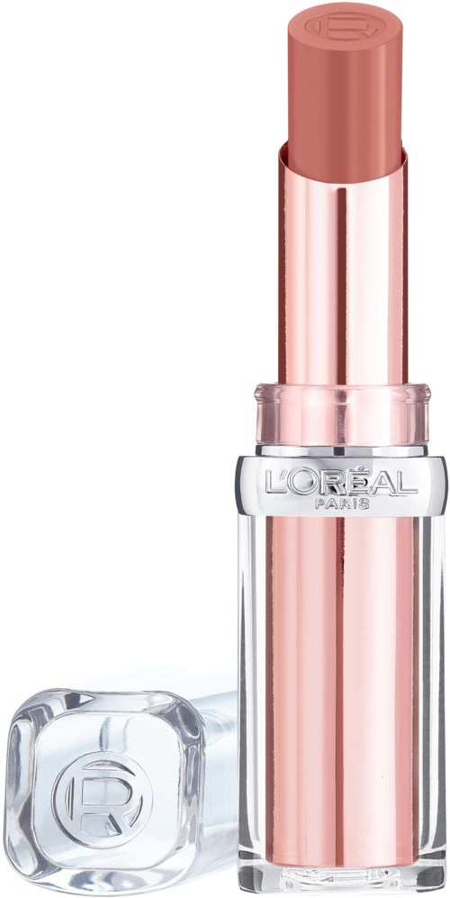 Ett rosa läppstift i ett klart, glänsande rör med silverdetaljer, står upprätt.
