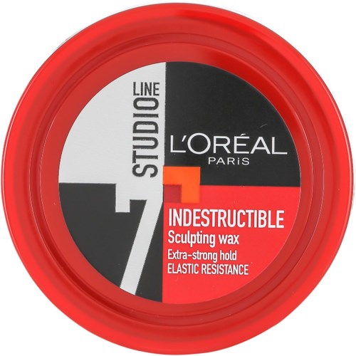 Punainen pyöreä säiliö, jossa musta, valkoinen ja oranssi etiketti. Sisältää L'Oréal Studio -linjan erehtymättömän muotoilusavon.