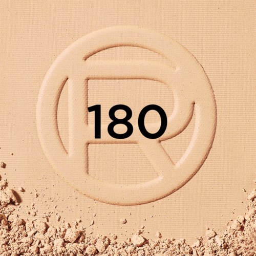 Ein runder Logo mit der Zahl 180 in der Mitte auf sandigem Hintergrund.