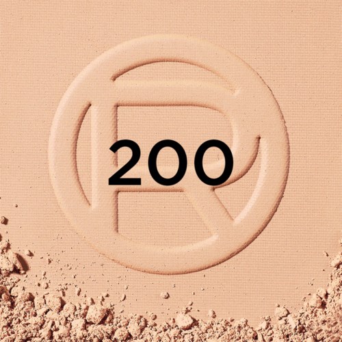 Ein rundes Logo mit der Zahl 200 darin, teils im Sand vergraben.