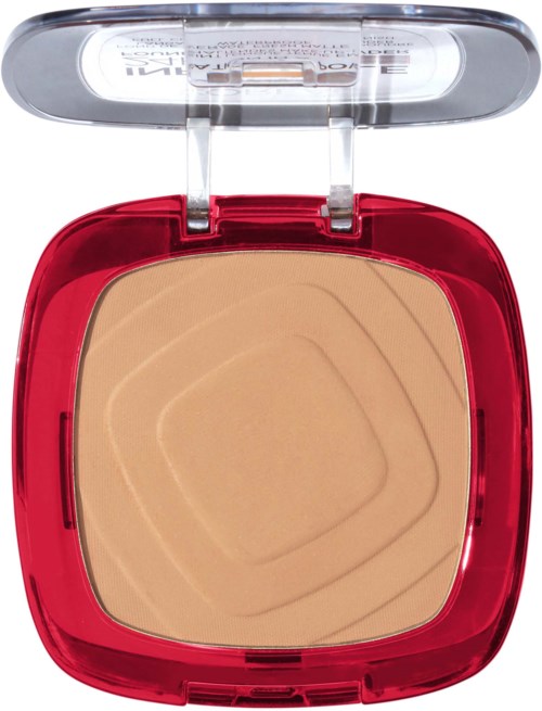 En röd kompakt med beige puder inuti och ett genomskinligt lock. Pudret har kvadratiska mönster på ytan.
