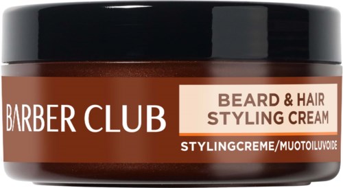 A brown jar labeled 'Barber Club Beard & Hair Styling Cream' with a black lid.