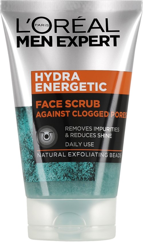 Srebrne opakowanie L'Oréal Men Expert Hydra Energetic Face Scrub z pomarańczowymi i czarnymi etykietami podkreślającymi korzyści.