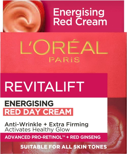 Pudełko z kosmetykami L'Oréal w czerwonych i różowych kolorach, promuje krem przeciwzmarszczkowy i ujędrniający dla wszystkich odcieni skóry.