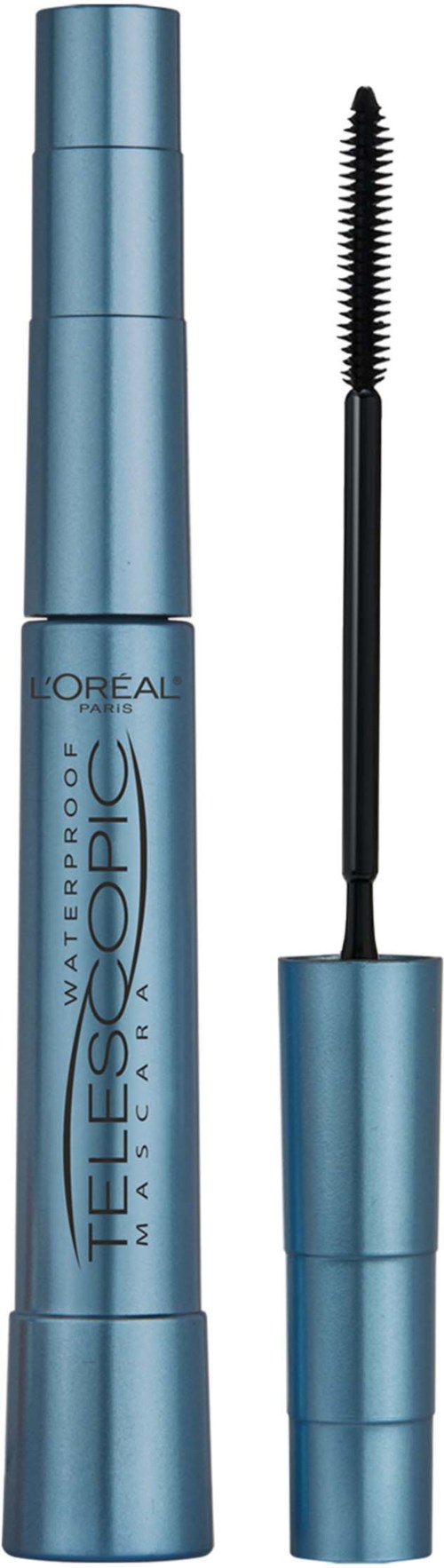 A blue mascara tube with the mascara wand next to it, showing the brush and the product branding.