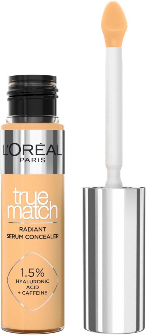 A beige bottle of concealer with an attached wand applicator and a silver cap.