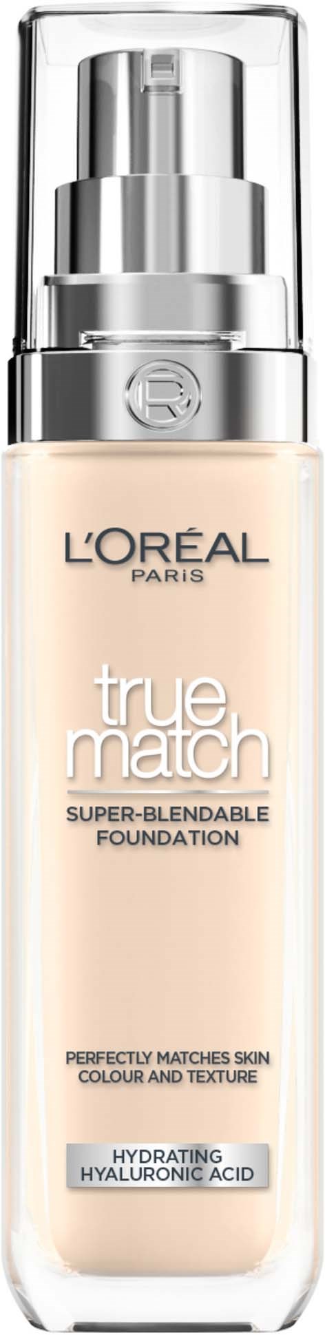 Eine Foundationsflasche mit Pumpen, mit dem Etikett 'L'Oreal True Match,' in klarem Behälter mit silberner Kappe.