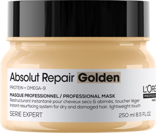 Een pot haarmasker met label "Absolut Repair Golden" voor droog en beschadigd haar, met zwarte dop en gedetailleerde productinfo.
