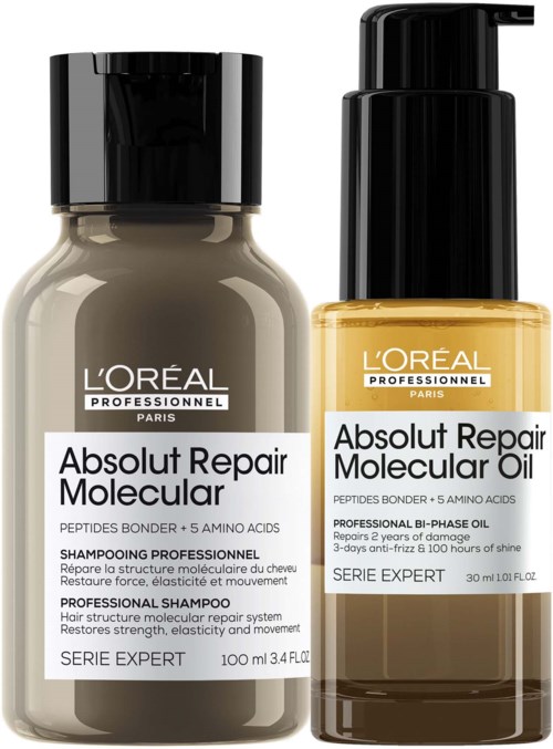 To flasker med L'Oréal hårpleieprodukter, en er sjampo for profesjonelt bruk og den andre er reparasjonsolje.