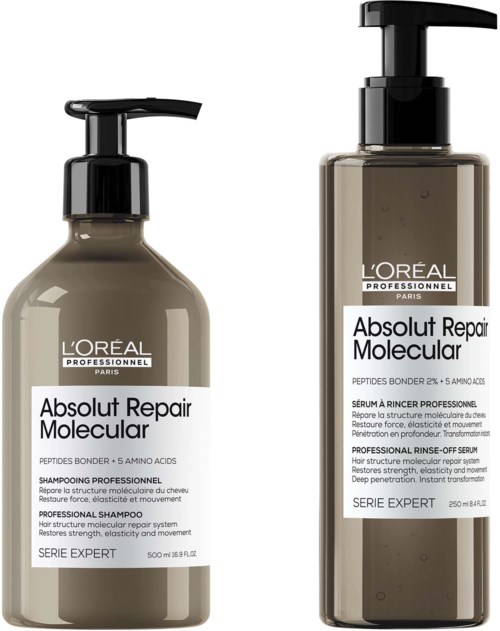 Zwei Shampoo-Flaschen für Haarpflege, gekennzeichnet als Authentic Repair und Absolute Repair Molecular, mit schwarzen Pumpenkappen.