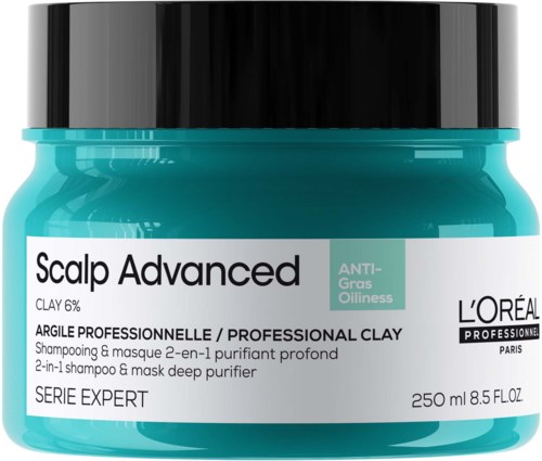 Ein tealfarbener Behälter mit silbernem Deckel, beschriftet als L'Oréal Kopfhaut- und Haarclay für Reinigung und Öligkeit.