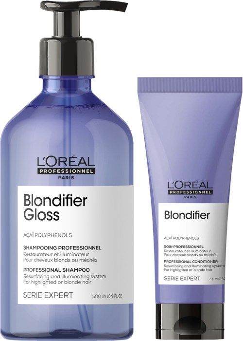 Blaue Shampoo- und Conditionerflaschen von L'Oréal, gekennzeichnet für blondes Haar und professionelle Verwendung.