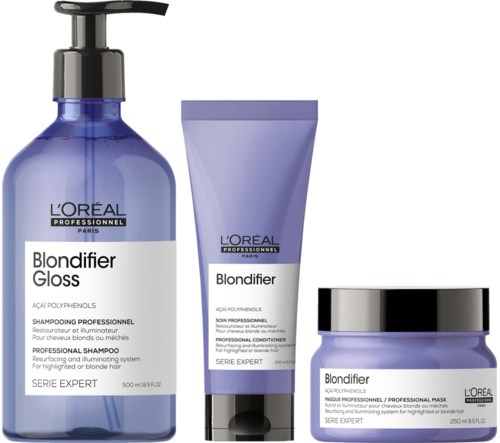 Drei L'Oréal Blondifier Haarprodukte: Shampoo, Conditioner und Maske in lila Behältern.
