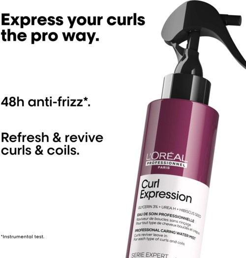 Eine lila Flasche L'Oreal Professional Haarspray für Locken, fördert Lockwiederherstellung und Anti-Frizz.