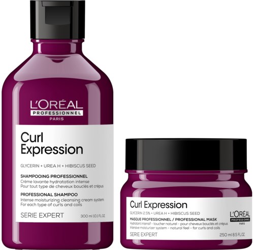 Zwei lila Haarpflegeprodukte von L'Oréal, Shampoo und Maske, für lockiges Haar mit Hibiskussamen.