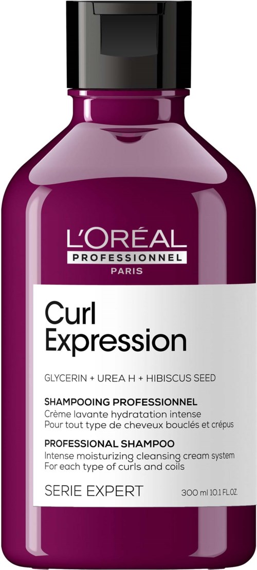 Eine lila Flasche L'Oréal Professionnel Curl Expression Shampoo mit schwarzem Deckel.