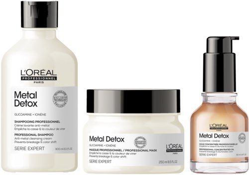 Drei L'Oréal-Haarprodukte mit "Metal Detox" für professionellen Gebrauch und antioxidative Reinigung. Eines ist ein Shampoo, das andere eine Maske und das dritte ein Serum.