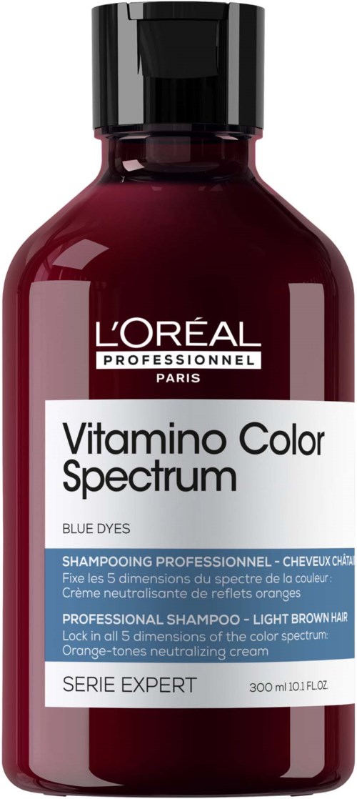 A small bottle of L'Oréal shampoo labeled 'Vitamino Color Spectrum' for light brown hair and blue dyes, 300ml.