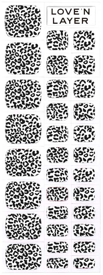 Multiple leopard print patterns in various sizes with the text "LOVE 'N LAYER" at the top.