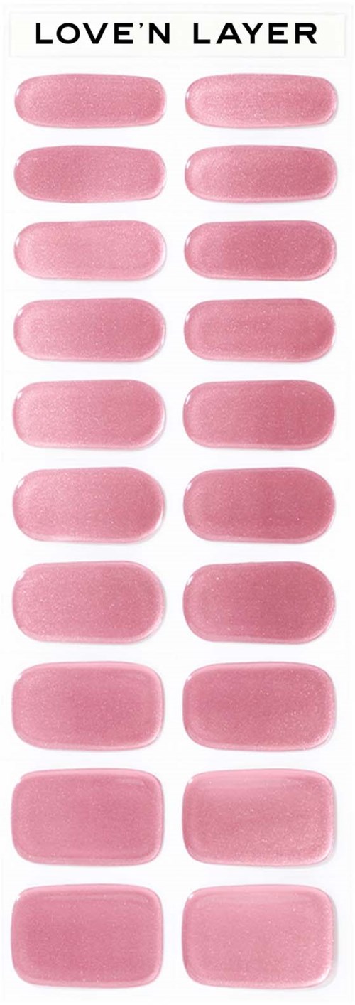 A strip of pink lipstick swatches labeled 'LOVE'N LAYER' with multiple oval-shaped samples.