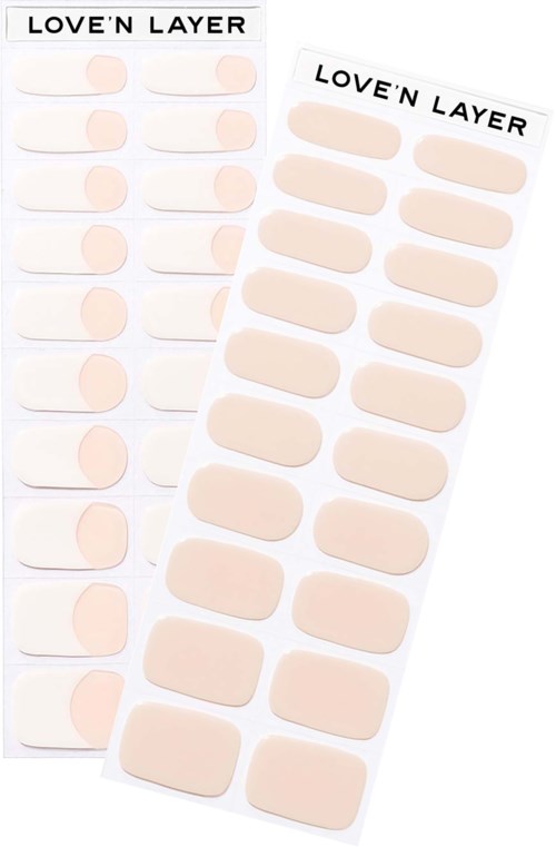Two sheets of beige adhesive patches labeled "LOVE'N LAYER" for skin care or beauty use.
