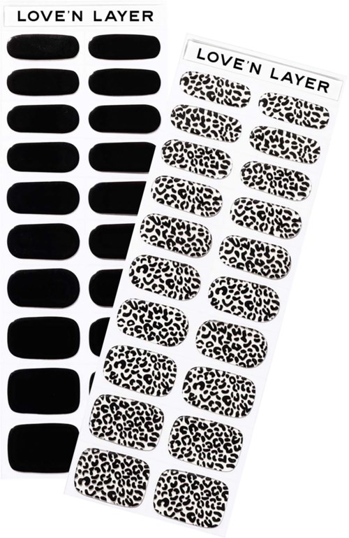 Two nail sticker sheets: one with all black nails, the other with black and white leopard print nails.
