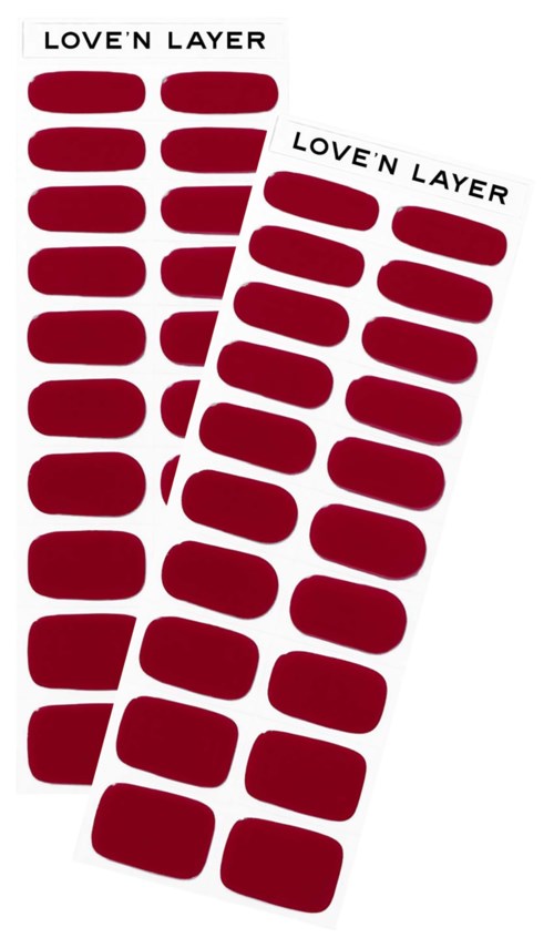 Two sheets of red nail stickers with the words "LOVE'N LAYER" at the top.