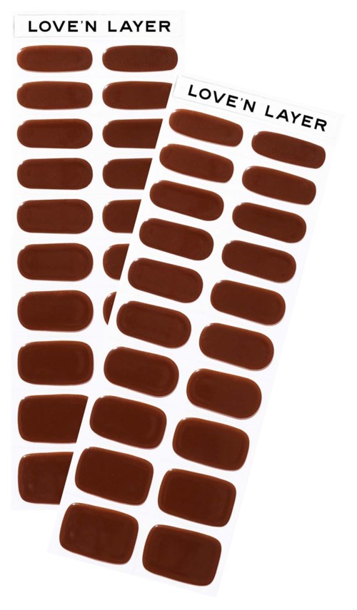 Two sheets of brown nail stickers labeled "LOVE'N LAYER" with various sizes and shapes.