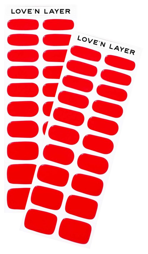 Two sheets with red heart-shaped stickers labeled 'LOVE'N LAYER'.