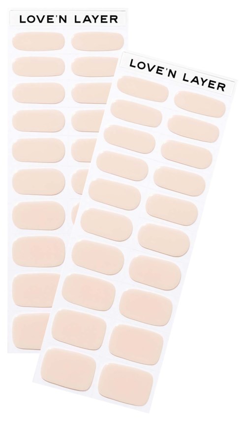 Two sheets of beige love-themed adhesive bandages with 'LOVE'N LAYER' label at the top.