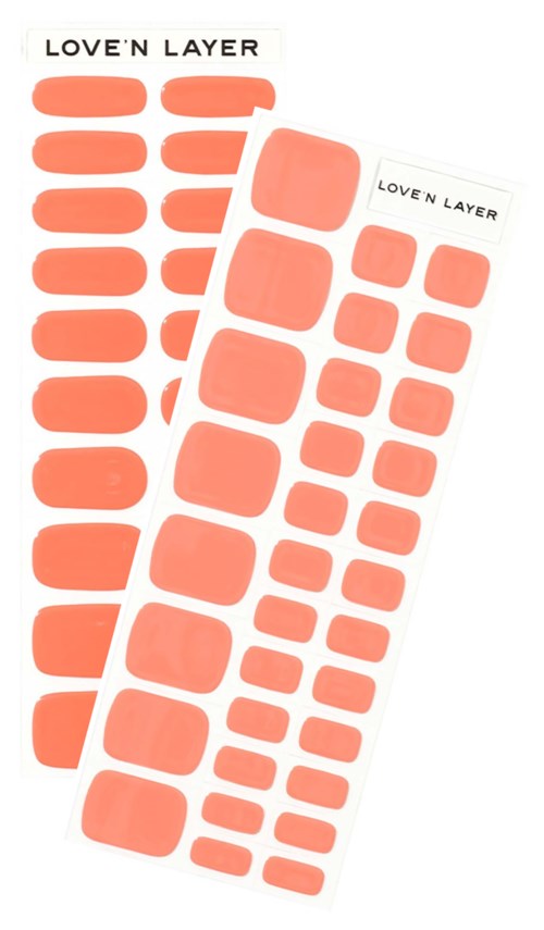 Two sheets of orange peel-off stickers with 'LOVE'N LAYER' written on top.