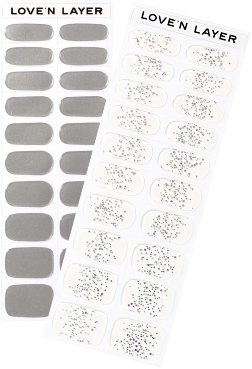 Two sheets of nail stickers, one plain gray and one with sparkly dotted designs, labeled 'LOVE'N LAYER' at the top.