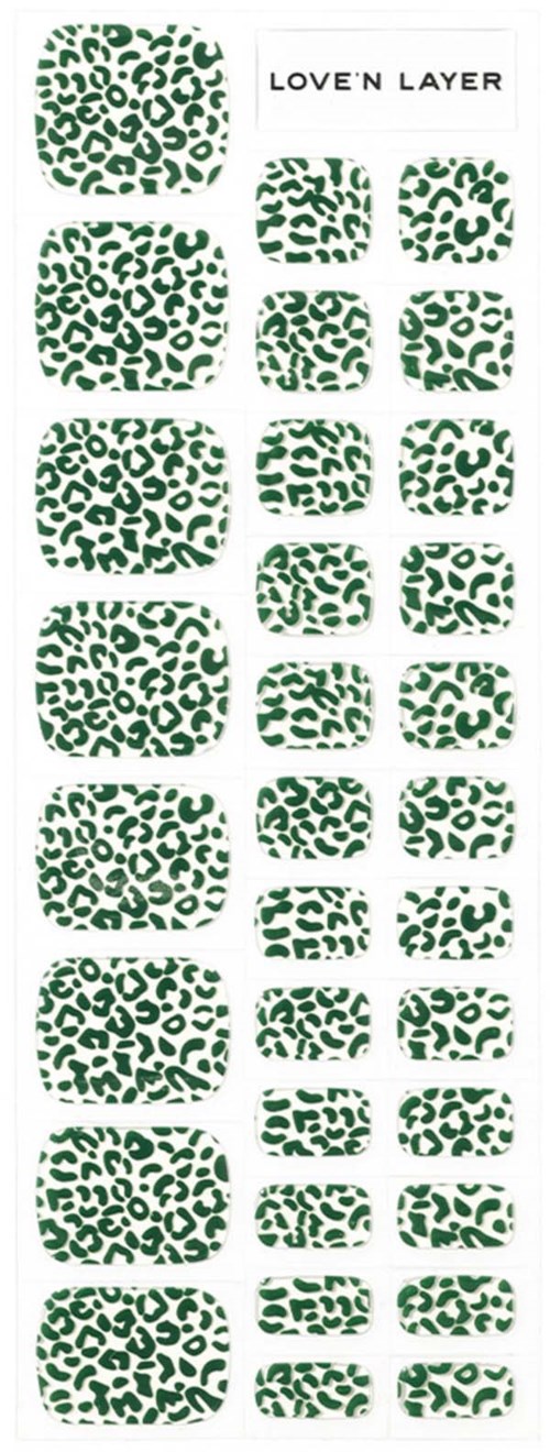 A sticker sheet with various green leopard print designs of different sizes, labeled "LOVE N LAYER" at the top.