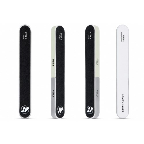 Four nail files are arranged vertically, with two black and two white, some with labels and a logo.