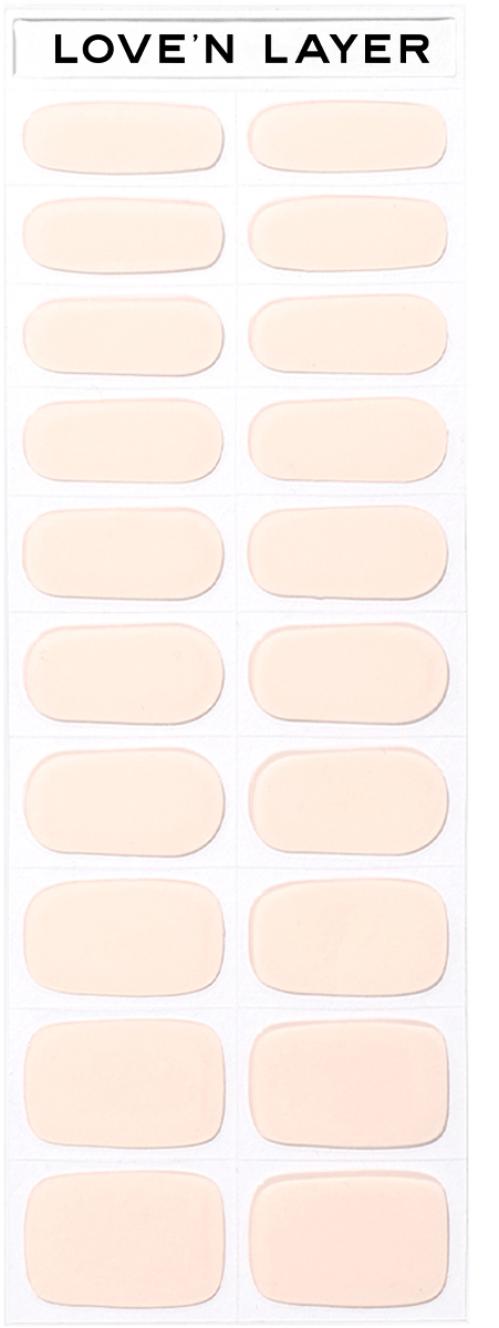 Skin-colored adhesive patches on a strip labeled 'LOVE'N LAYER' for skin care.