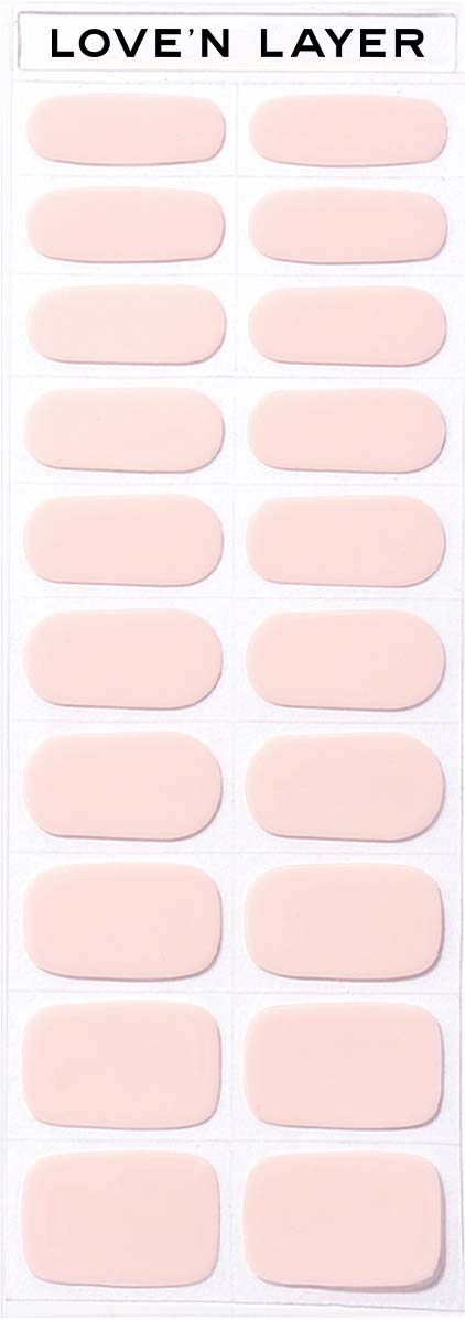 A strip of nail covers called Love'n Layer, light pink color, arranged in rows on a card.