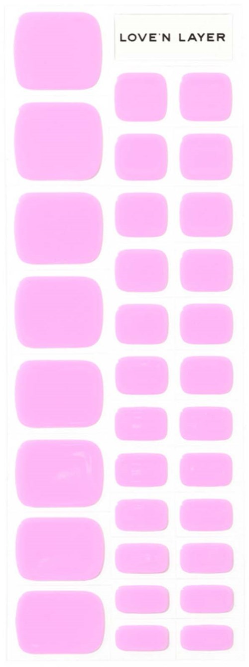 A sheet with pink stickers of various sizes, labeled 'LOVE N LAYER' at the top.