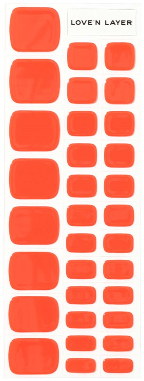 Sheet of orange nail stickers in various sizes, with 'LOVE N LAYER' text at top.