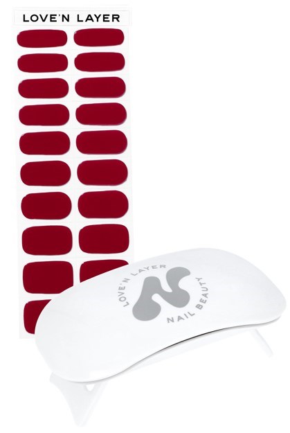 A set of red nail stickers and a white nail gel buffer with a logo. The stickers are in a strip.