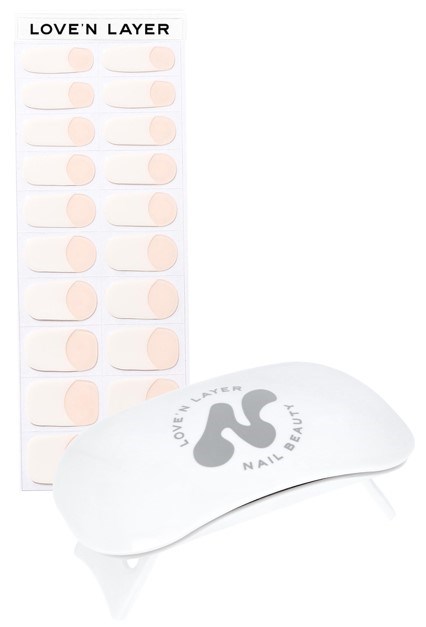 A set of nail patches labeled 'LOVE'N LAYER' and a white nail device with 'NAIL BEAUTY' text and logo.