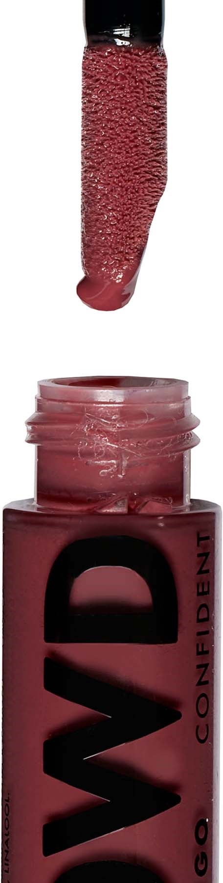 Lippenstift in roze met een zwarte dop, met de lipstick boven de tube.